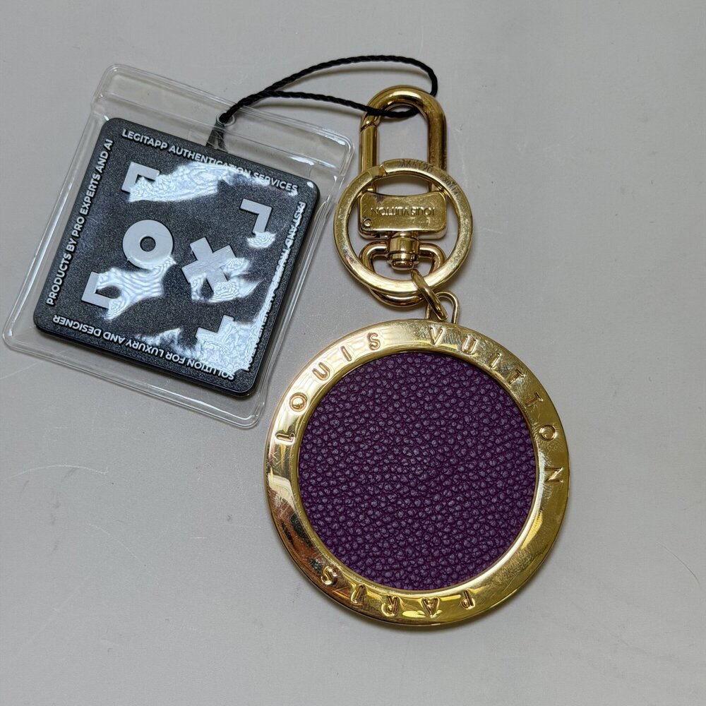 Louis Vuitton LV Circle Bag Charm and Key Holder in a striking purple and gold c